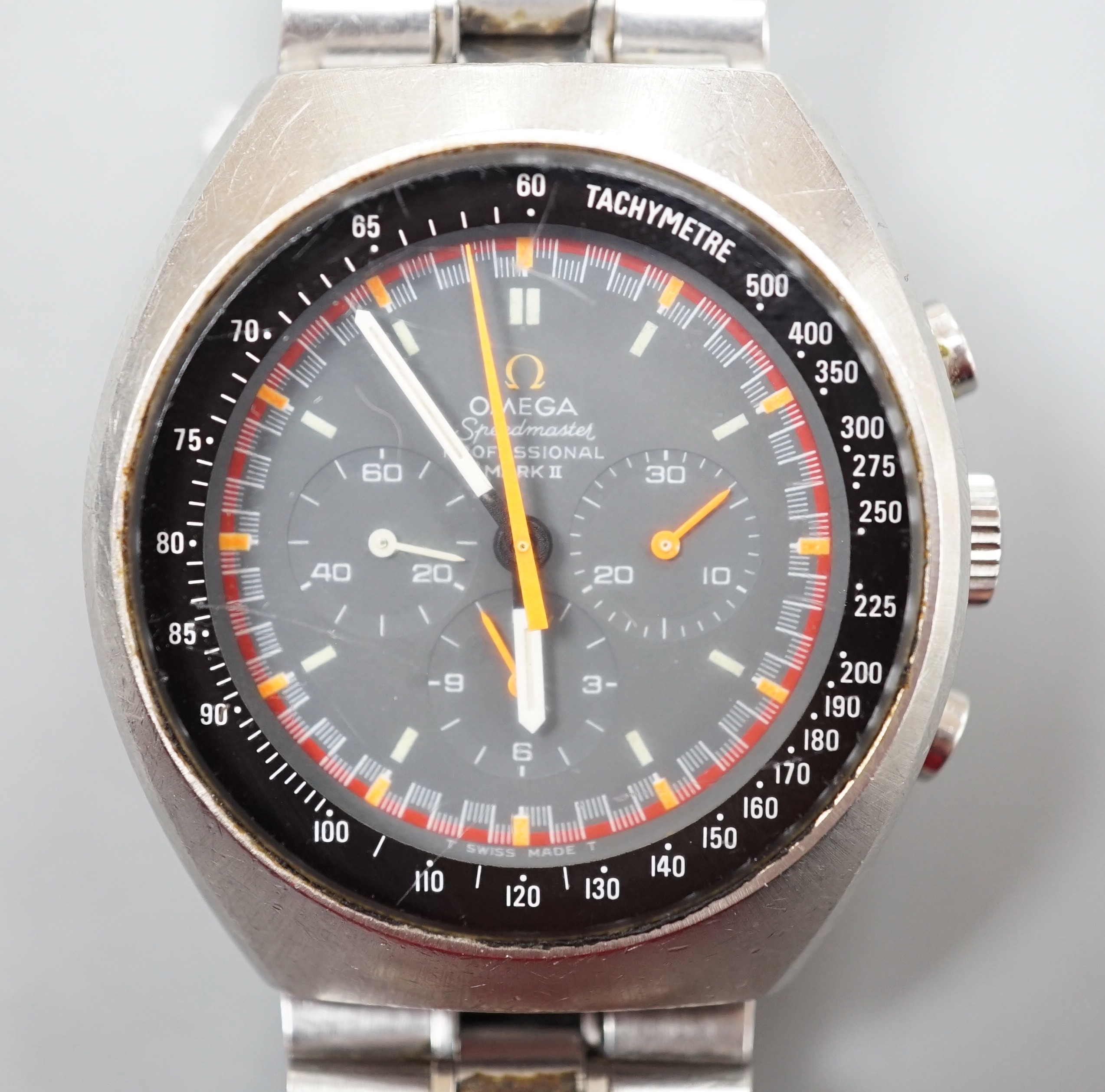 A gentleman's early 1970's stainless steel Omega Speedmaster Professional Mark II chronograph wrist watch, on Omega stainless steel bracelet, case diameter 42mm, no box or papers.